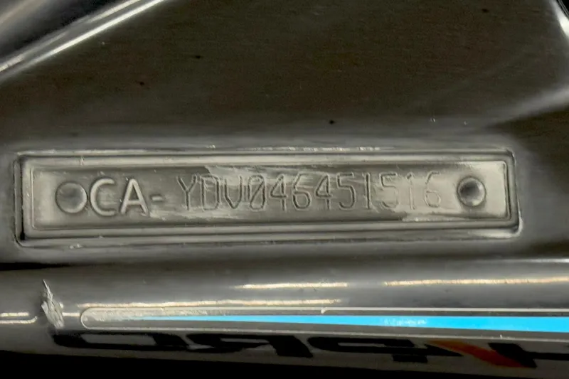 Slide: The Image of Close-up of a 2016 Sea-Doo GTX 155 hull identification number plate. - 12