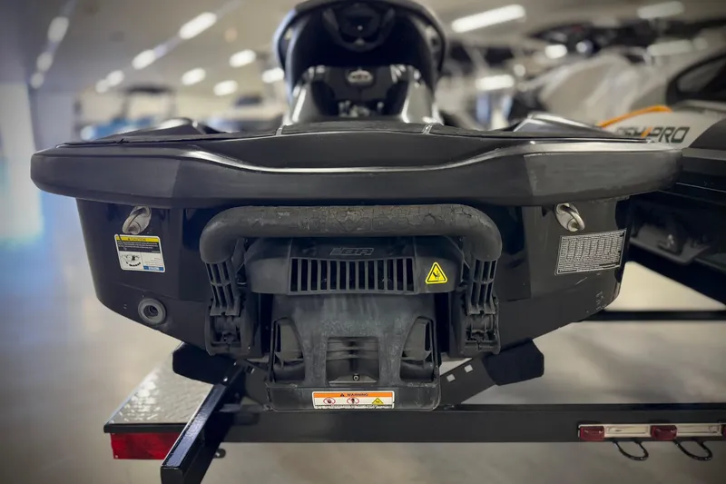 Slide: The Image of 2016 Sea-Doo GTX 155 rear view on trailer in showroom. - 4