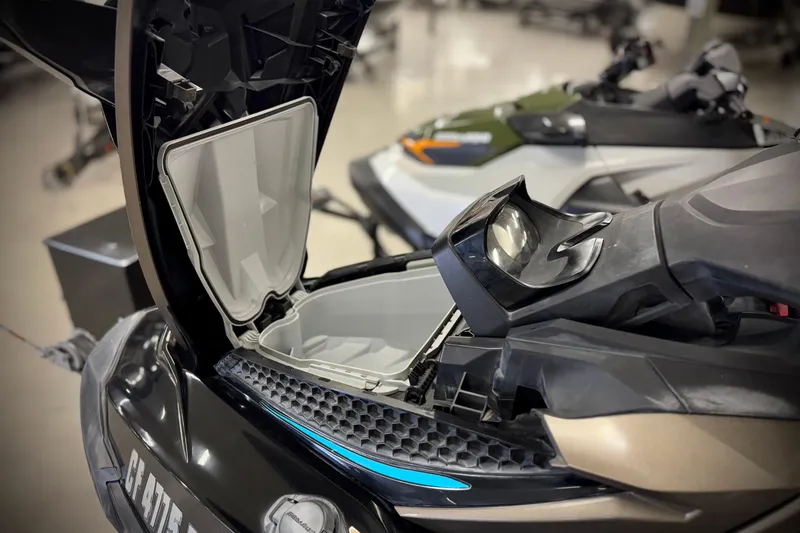 Slide: The Image of 2016 Sea-Doo GTX 155 with open storage compartment, showcasing sleek design and functionality. - 8