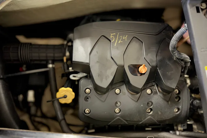 Slide: The Image of 2016 Sea-Doo GTX 155 engine close-up with visible components and wiring. - 9