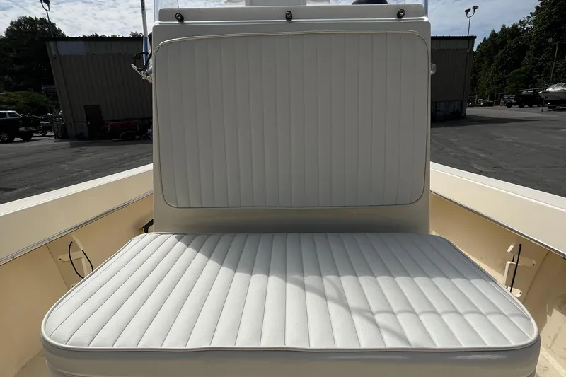 Slide: The Image of 2025 Jones Brothers 23 Cape Fisherman Lite Tackle boat seating area, outdoor view. - 12
