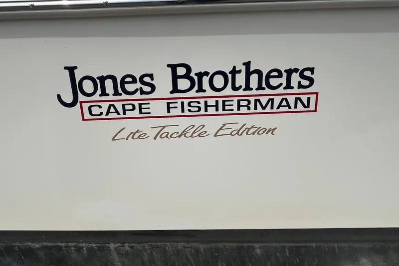 Slide: The Image of Jones Brothers 23 Cape Fisherman Lite Tackle Edition, 2025 model boat logo. - 4