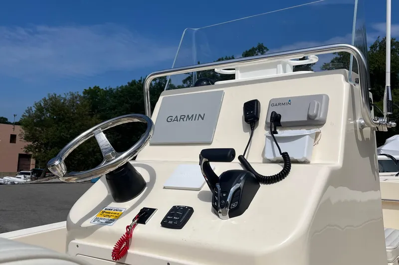 Slide: The Image of Control panel of 2025 Jones Brothers 23 Cape Fisherman Lite Tackle boat with Garmin equipment. - 5