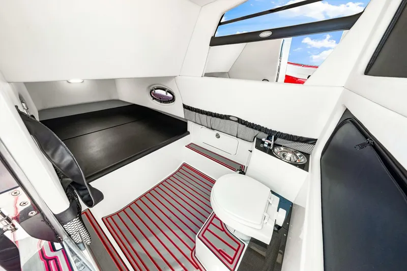 Slide: The Image of 2022 Nor-Tech 390 SS cabin interior with modern amenities and sleek design. - 44