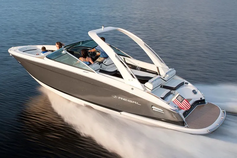Slide: The Image of Manufacturer Provided Image: 2018 Regal 2800 Bowrider cruising on water with passengers. - 12