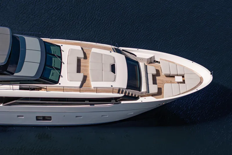 Slide: The Image of Aerial view of 2023 Sanlorenzo SL120A luxury yacht on water. - 11
