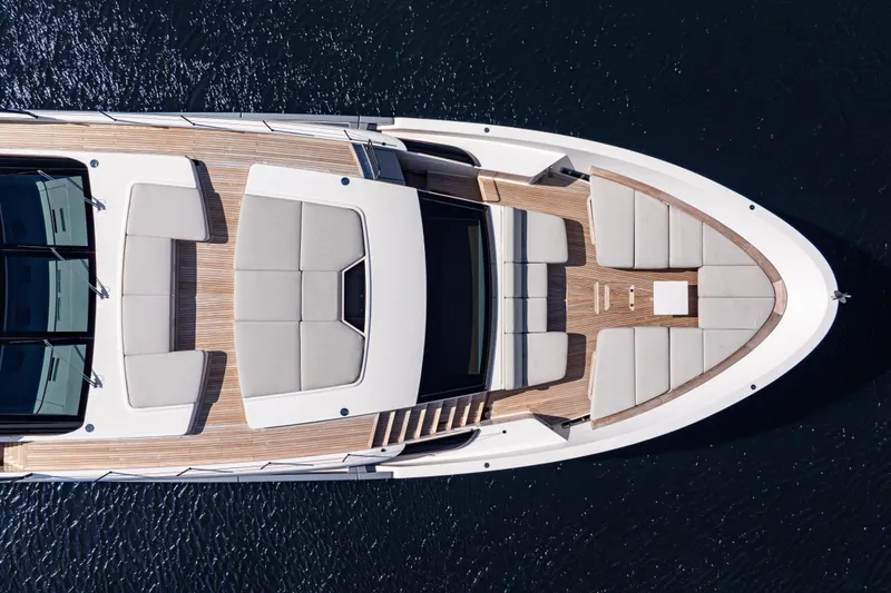 Slide: The Image of Top view of 2023 Sanlorenzo SL120A yacht with elegant deck and seating. - 12