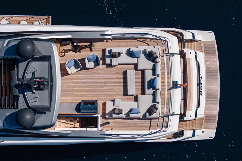 Slide: The Image of Aerial view of 2023 Sanlorenzo SL120A yacht with spacious deck and seating area. - 13