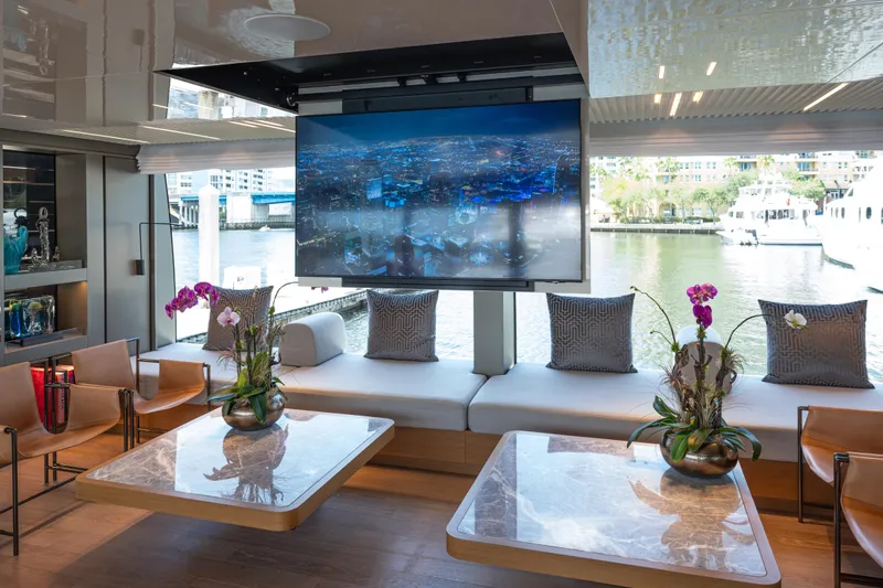 Slide: The Image of Luxurious 2023 Sanlorenzo SL120A yacht interior with modern decor and waterfront view. - 22