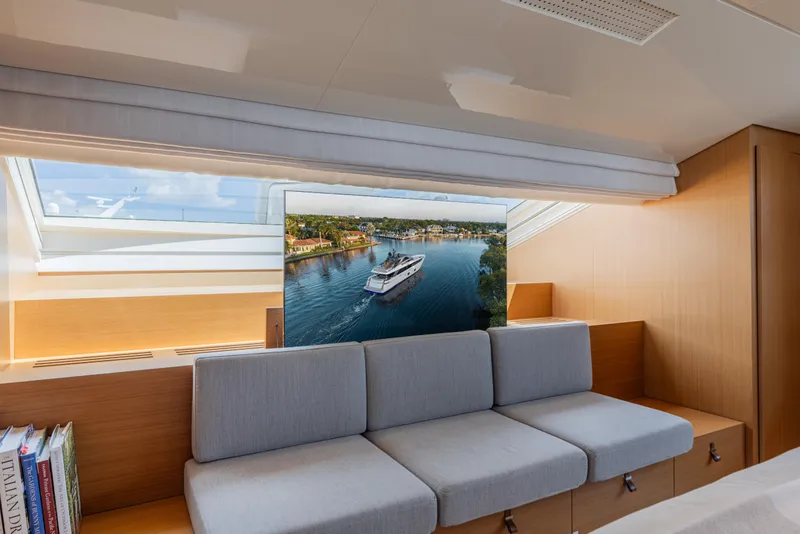 Slide: The Image of Luxurious interior of 2023 Sanlorenzo SL120A yacht with modern seating and scenic view. - 31