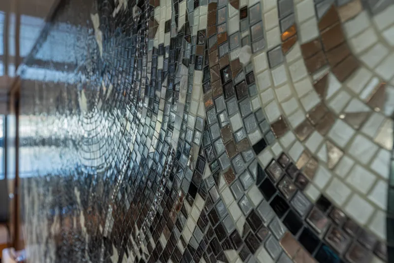 Slide: The Image of Close-up of intricate mosaic tiles on 2023 Sanlorenzo SL120A yacht interior. - 33