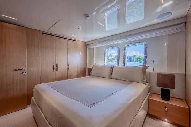 Slide: The Image of Luxurious bedroom interior of 2023 Sanlorenzo SL120A yacht with elegant wood finishes. - 37