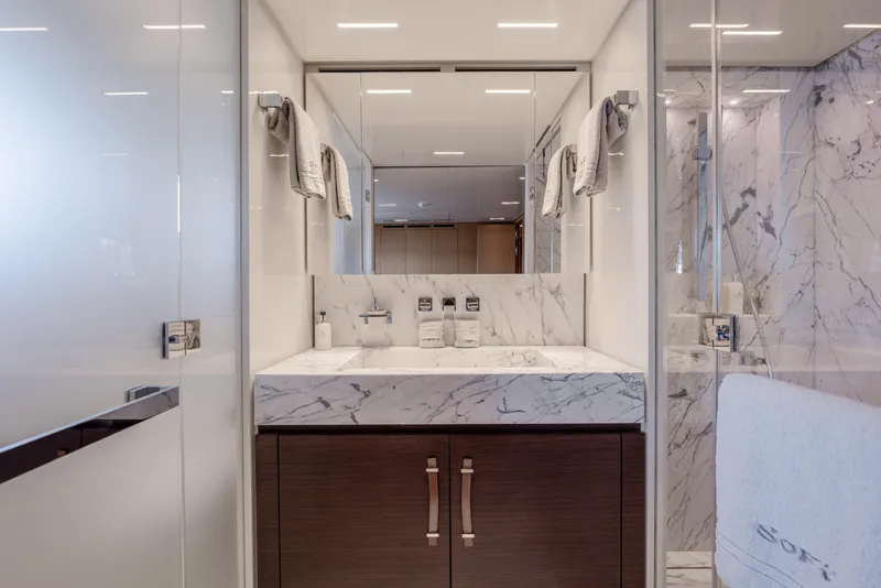 Slide: The Image of Luxurious bathroom in 2023 Sanlorenzo SL120A yacht with marble sink and modern fixtures. - 38
