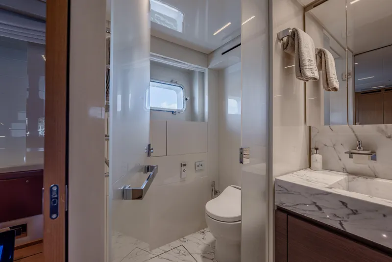 Slide: The Image of Luxurious bathroom on 2023 Sanlorenzo SL120A yacht with marble sink and modern fixtures. - 39