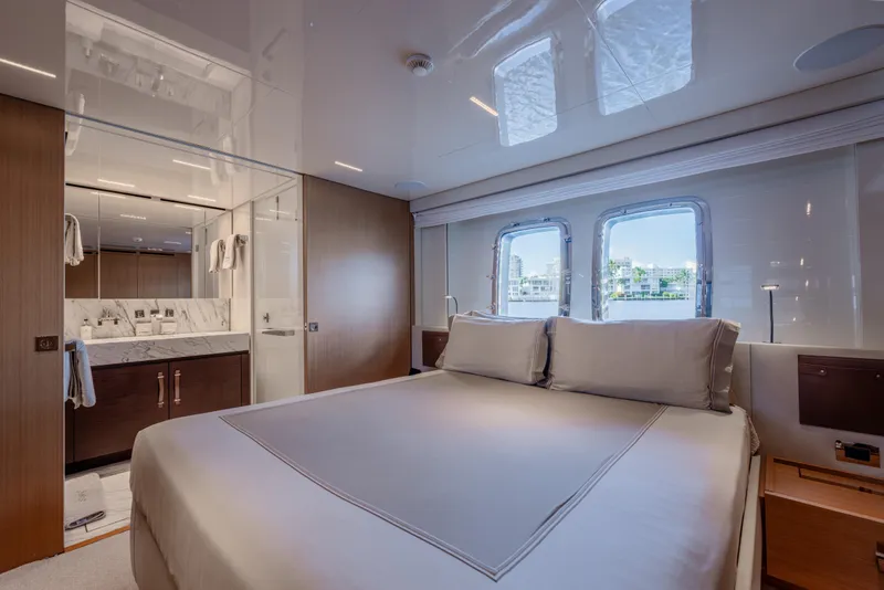 Slide: The Image of Luxurious bedroom interior of 2023 Sanlorenzo SL120A yacht with elegant design and large windows. - 41