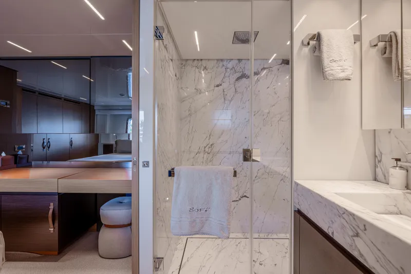 Slide: The Image of Luxurious bathroom on 2023 Sanlorenzo SL120A yacht with marble shower and modern vanity. - 42