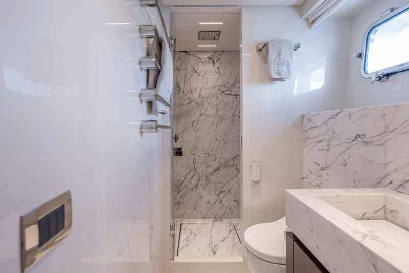Slide: The Image of Luxurious marble bathroom in 2023 Sanlorenzo SL120A yacht, featuring modern fixtures and elegant design. - 47