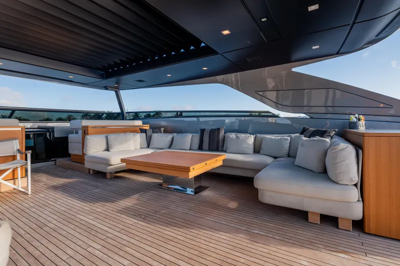 Slide: The Image of Luxurious 2023 Sanlorenzo SL120A yacht deck with modern seating and elegant design. - 54