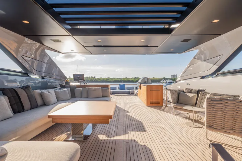 Slide: The Image of Luxurious 2023 Sanlorenzo SL120A yacht deck with elegant seating and modern design. - 55