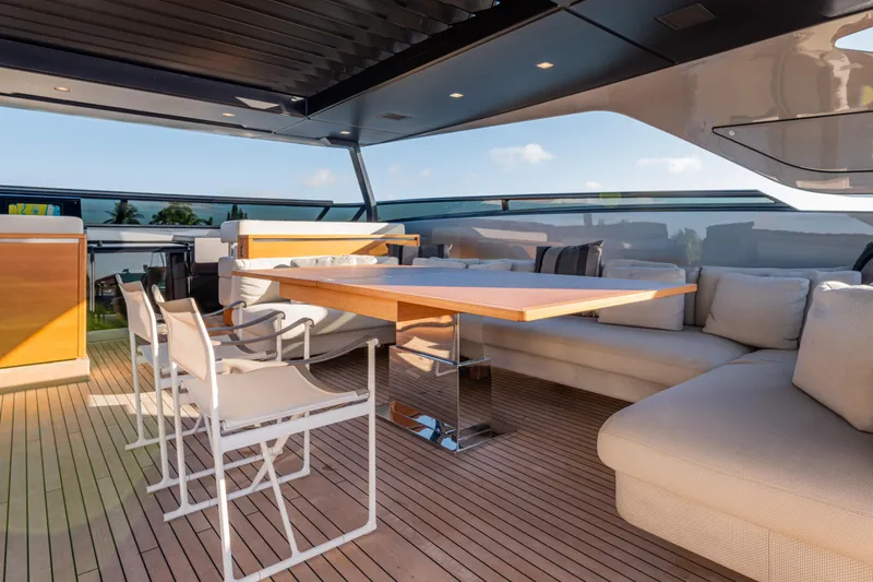 Slide: The Image of Luxurious 2023 Sanlorenzo SL120A yacht deck with elegant seating and modern design. - 56