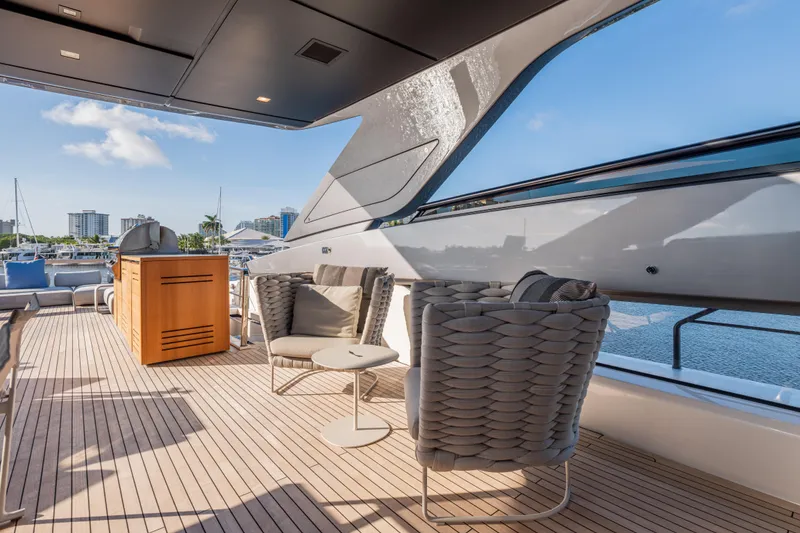 Slide: The Image of Luxurious 2023 Sanlorenzo SL120A yacht deck with modern seating and ocean view. - 59