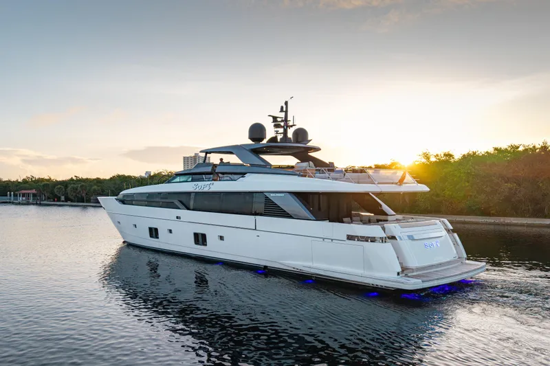 Slide: The Image of 2023 Sanlorenzo SL120A yacht cruising at sunset on calm waters. - 6