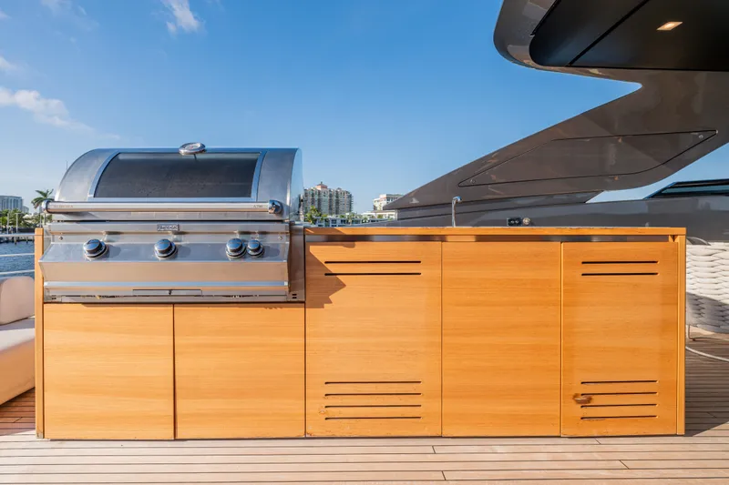 Slide: The Image of Outdoor kitchen with grill on 2023 Sanlorenzo SL120A yacht deck. - 60