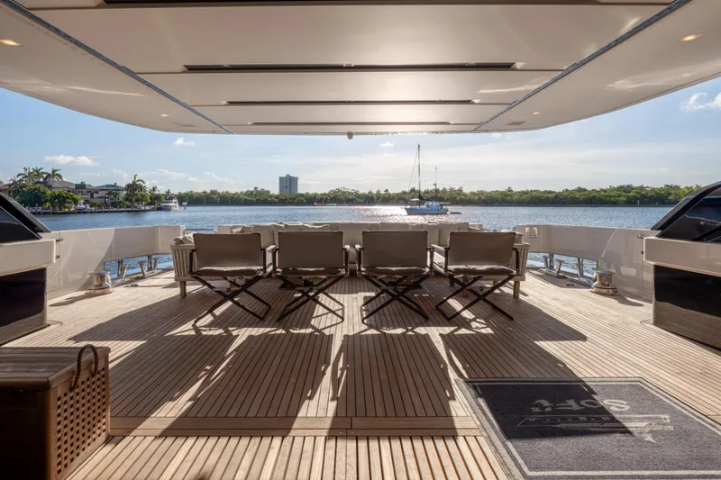 Slide: The Image of Luxurious 2023 Sanlorenzo SL120A yacht deck with elegant seating and scenic waterfront view. - 67