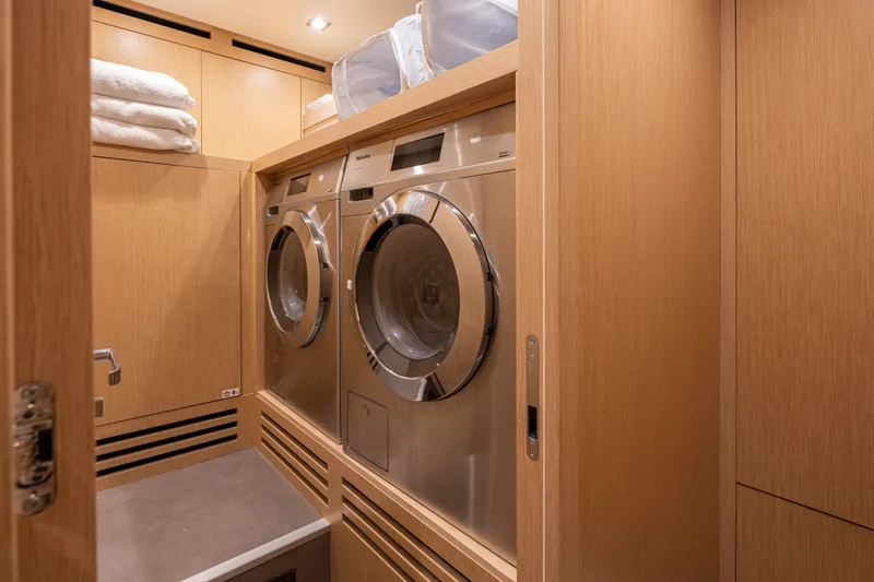 Slide: The Image of Laundry room with modern appliances on 2023 Sanlorenzo SL120A yacht. - 71