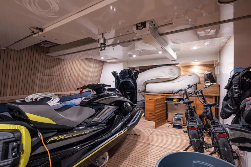Slide: The Image of Luxury yacht Sanlorenzo SL120A 2023 garage with jet ski, bicycles, and storage. - 74