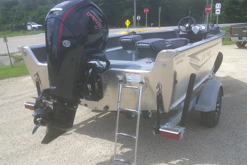 Slide: The Image of 2026 Lund 1800 Explorer SS boat with Mercury Pro XS engine on trailer. - 14