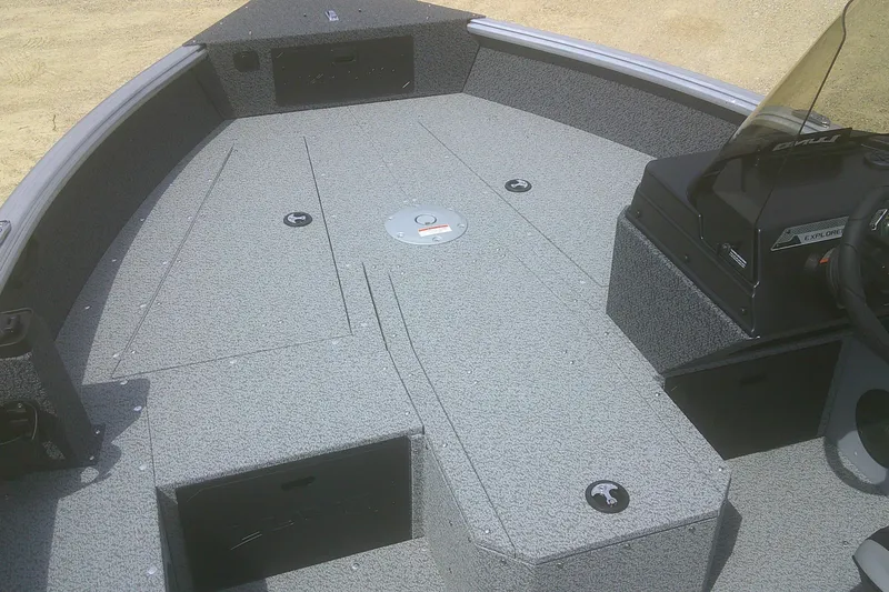 Slide: The Image of 2026 Lund 1800 Explorer SS boat interior with spacious deck and console. - 3