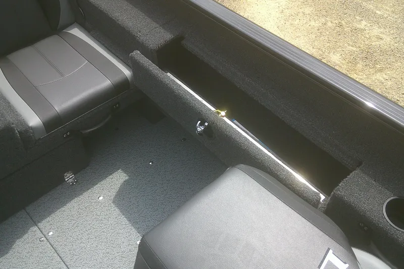 Slide: The Image of Interior of 2026 Lund 1675 Adventure SS boat with seating and storage compartment. - 9