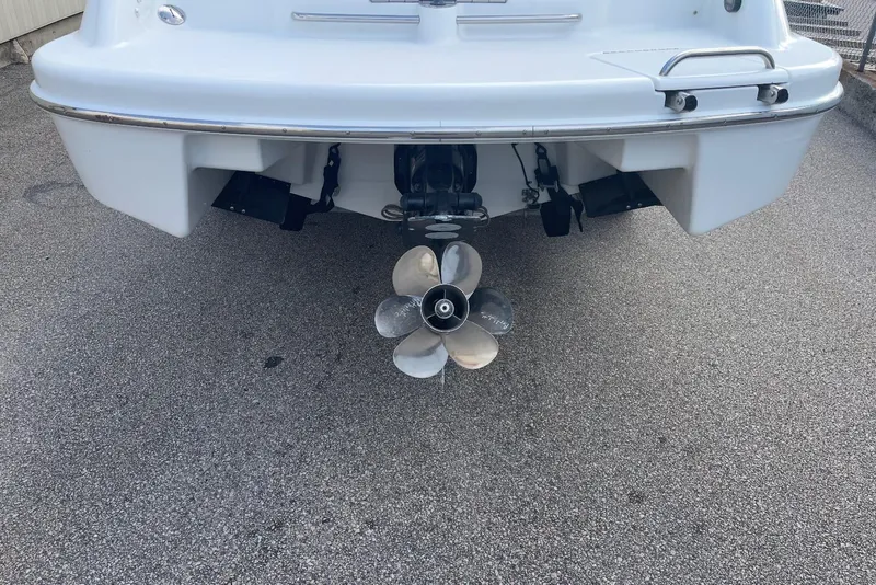Slide: The Image of Rear view of a 2005 Formula 240 Bowrider boat with visible propeller. - 24