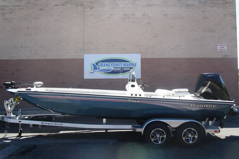 The Image of 2025 Ranger RB210 boat on trailer at Grand Pointe Marina. - 1