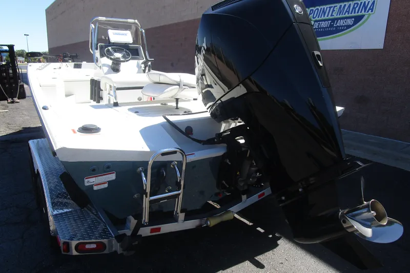 Slide: The Image of 2025 Ranger RB210 boat with powerful outboard motor on a trailer. - 16