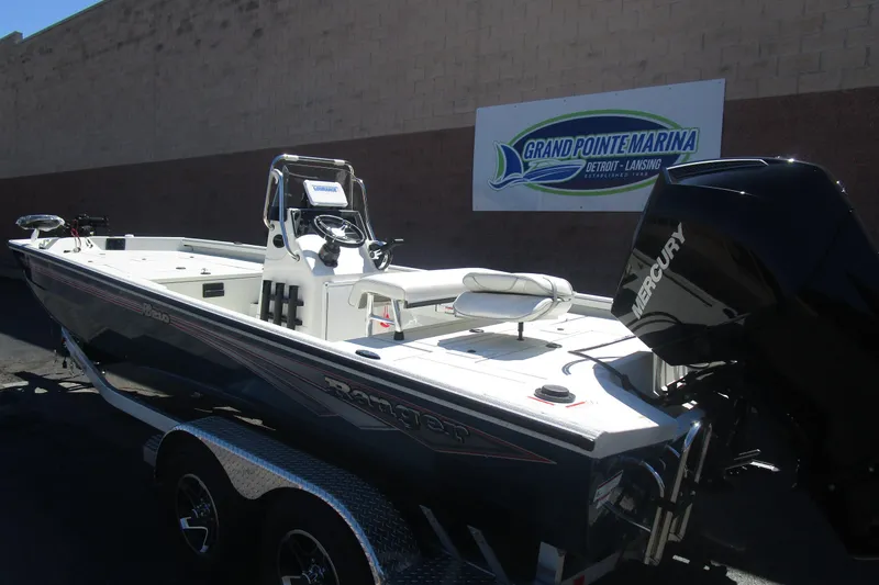 Slide: The Image of 2025 Ranger RB210 boat at Grand Pointe Marina with Mercury engine. - 3