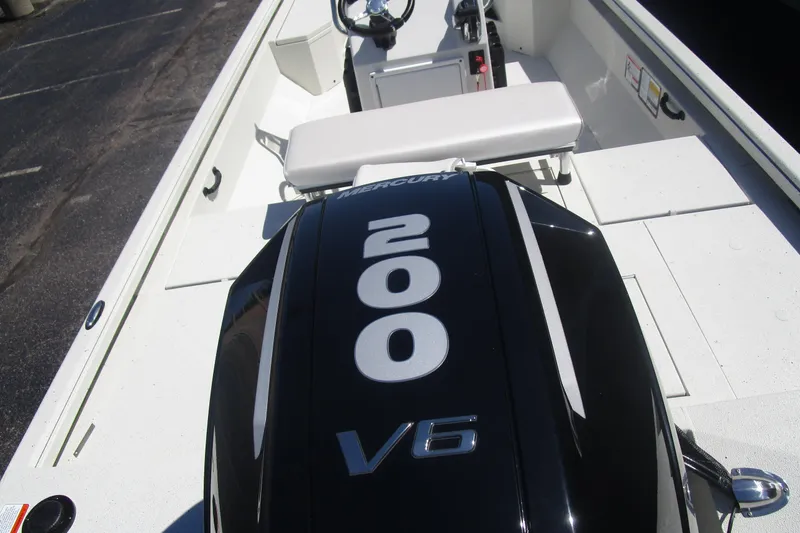Slide: The Image of 2025 Ranger RB210 boat with Mercury 200 V6 engine, white interior. - 7