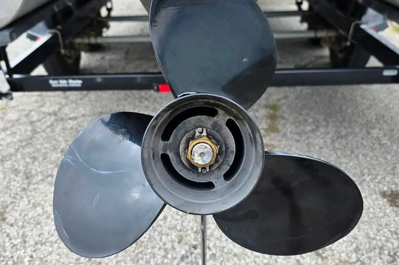 Slide: The Image of Close-up of a boat propeller from a 2012 Sun Tracker 22 Party Barge Deluxe. - 10