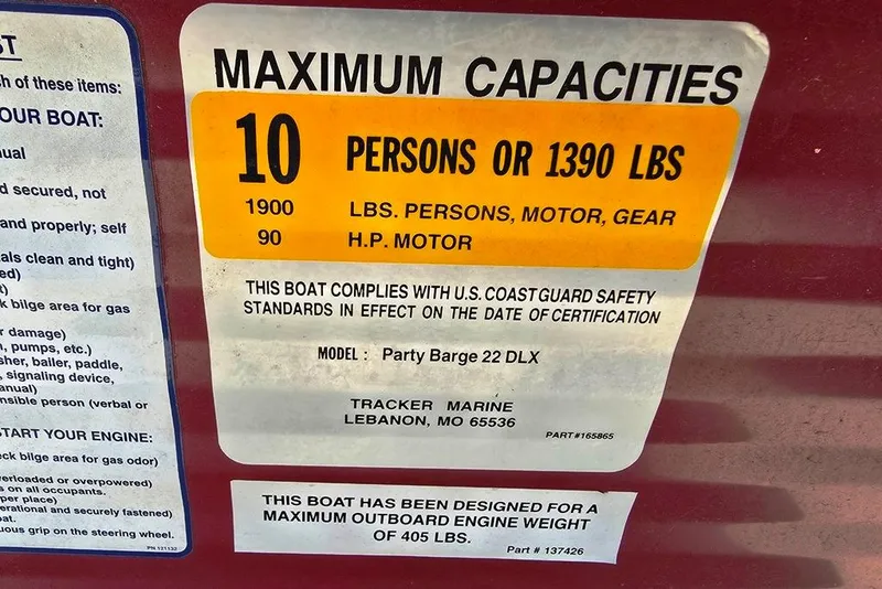 Slide: The Image of 2012 Sun Tracker 22 Party Barge Deluxe capacity label, 10 persons or 1390 lbs, 90 HP motor. - 15