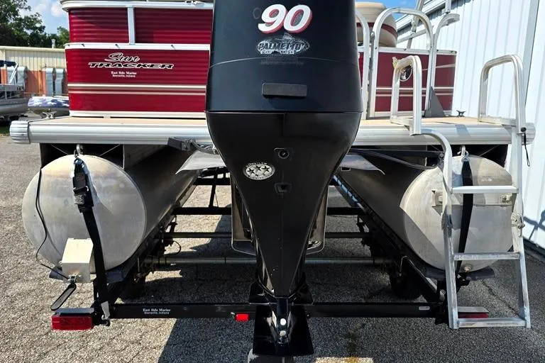Slide: The Image of 2012 Sun Tracker 22 Party Barge Deluxe pontoon boat with 90 HP engine, rear view. - 8