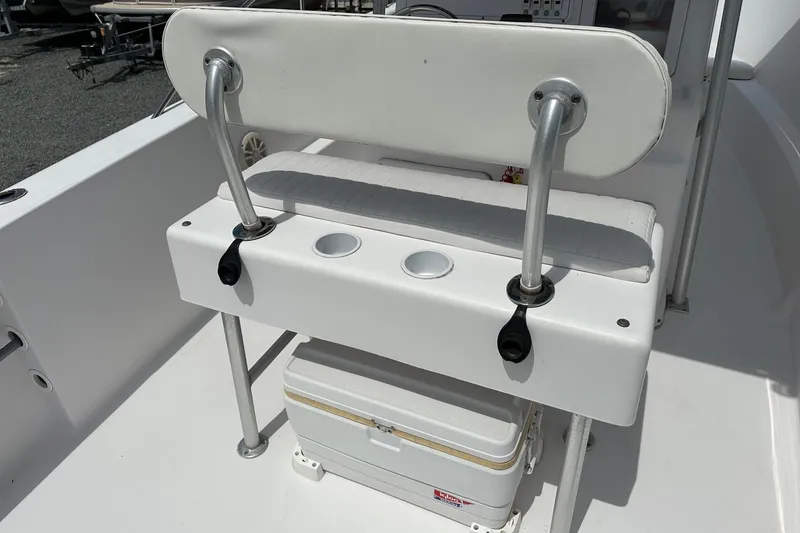 Slide: The Image of 2003 PROLINE Sport Center Console boat seat with cooler storage underneath. - 10