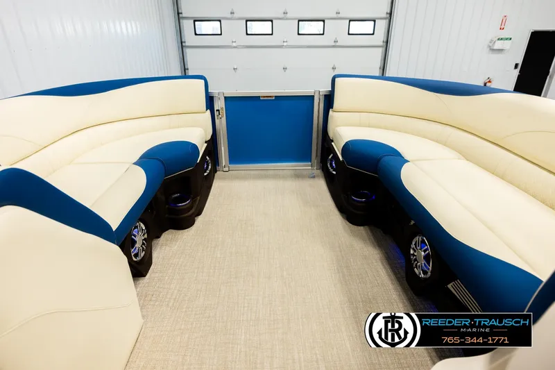Slide: The Image of Luxurious 2026 Avalon LSZ VRB pontoon interior with blue and cream seating. - 18