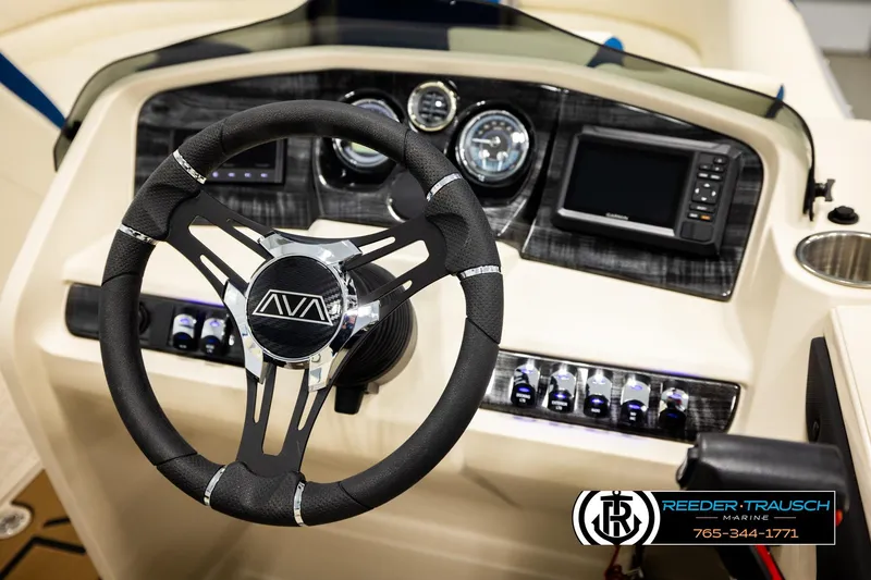 Slide: The Image of Steering wheel and dashboard of 2026 Avalon LSZ VRB boat, featuring modern controls and display. - 34