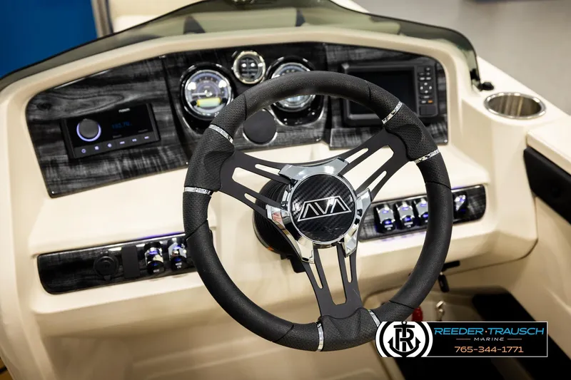 Slide: The Image of Steering wheel and dashboard of 2026 Avalon LSZ VRB boat, featuring modern controls and design. - 35