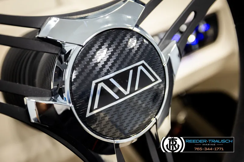Slide: The Image of Steering wheel of 2026 Avalon LSZ VRB with carbon fiber design and logo. - 36