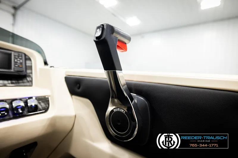 Slide: The Image of Close-up of 2026 Avalon LSZ VRB boat throttle control in a modern cockpit. - 43