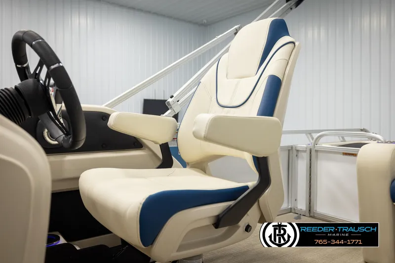 Slide: The Image of Luxurious 2026 Avalon LSZ VRB boat interior with plush captain's chair and steering wheel. - 44