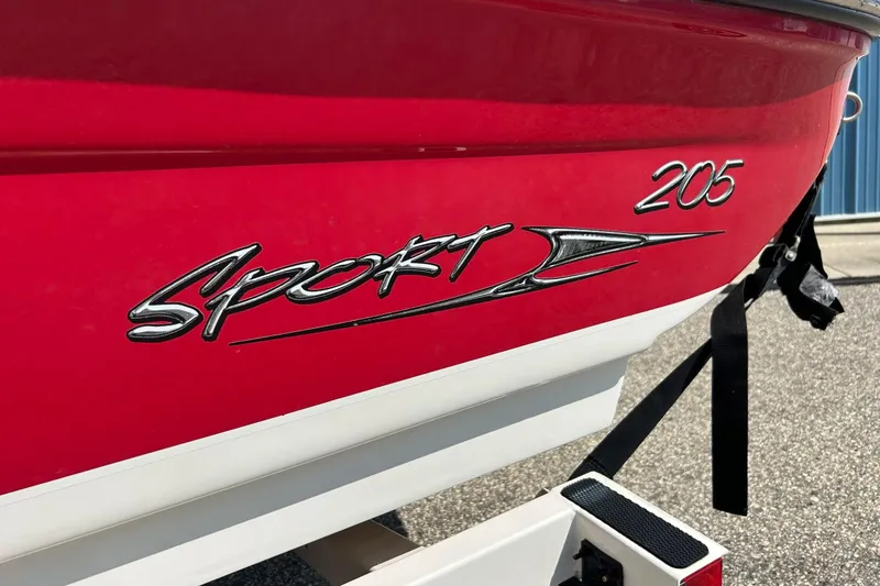 Slide: The Image of Red 2008 Searay 205 SPORT boat with sleek logo design. - 21