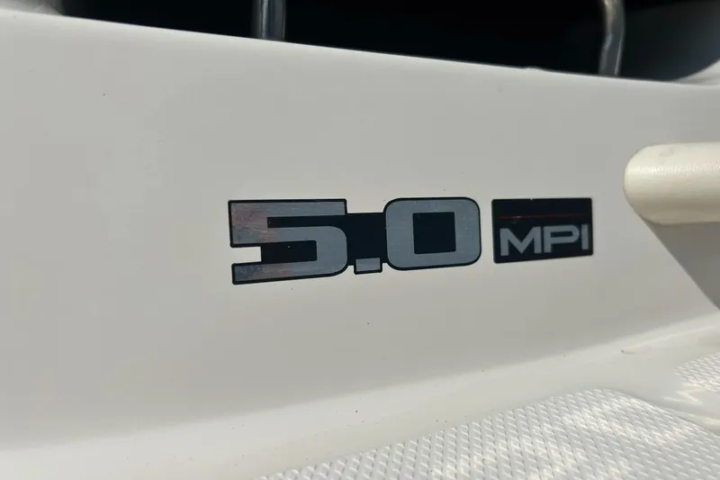 Slide: The Image of Close-up of 2008 Searay 205 SPORT 5.0 MPI engine emblem. - 22